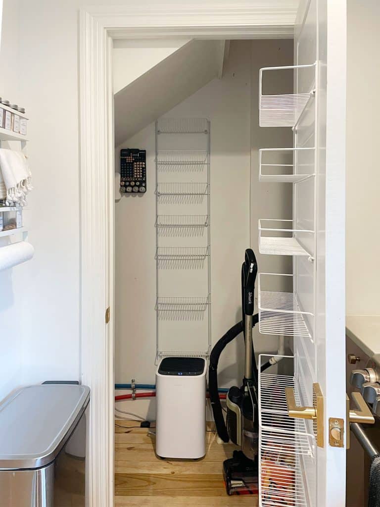 During Photo Of Utility Closet With Wire Shelving Emptied
