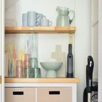 Detail of Utility Closet With Pretty Butcher Block Shelving