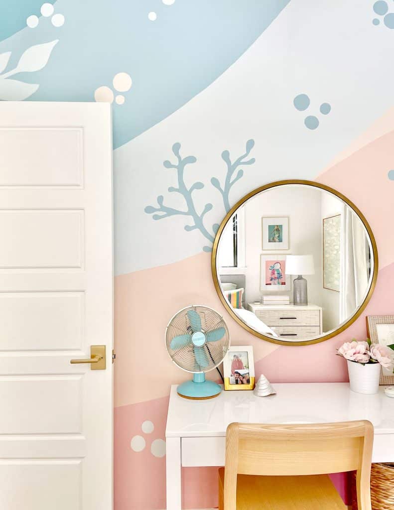 Colorful Girls Bedroom With Blue Pink Coral Beachy Mural With Gold Mirror Over Desk