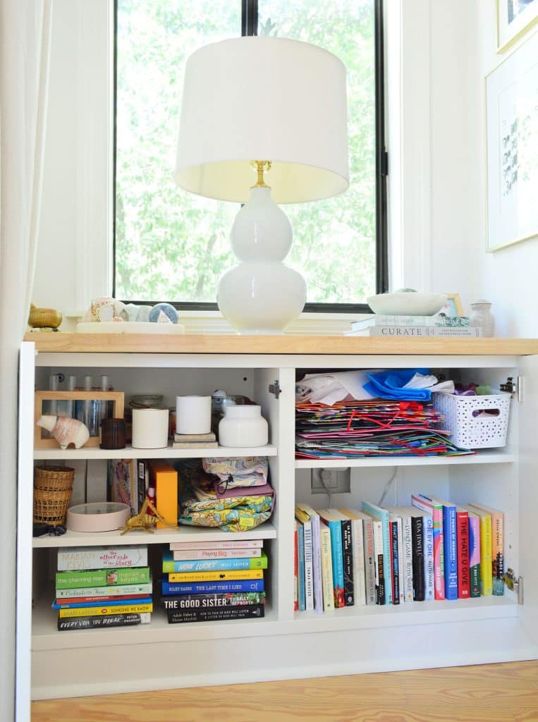 Ikea Besta unit open to display Stroage books and decor