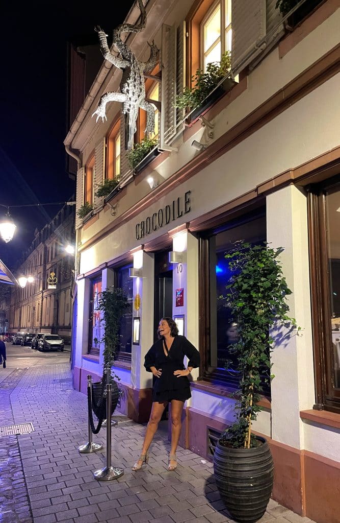 Sherry outside Crocodile restaurant in short black dress