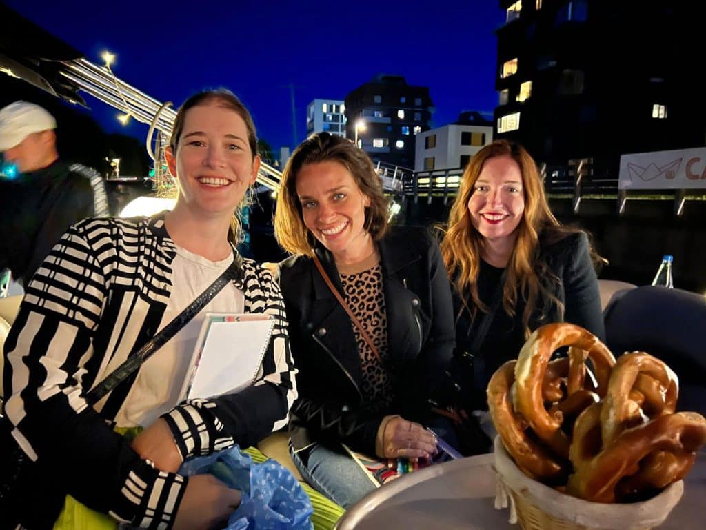 Sherry with other girls on riverboat cruise with leopard sweater under a black blazer