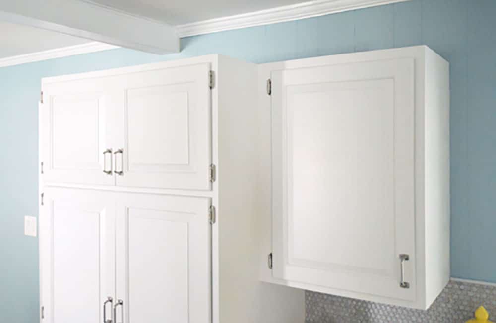 Top of white cabinets before crown molding is added