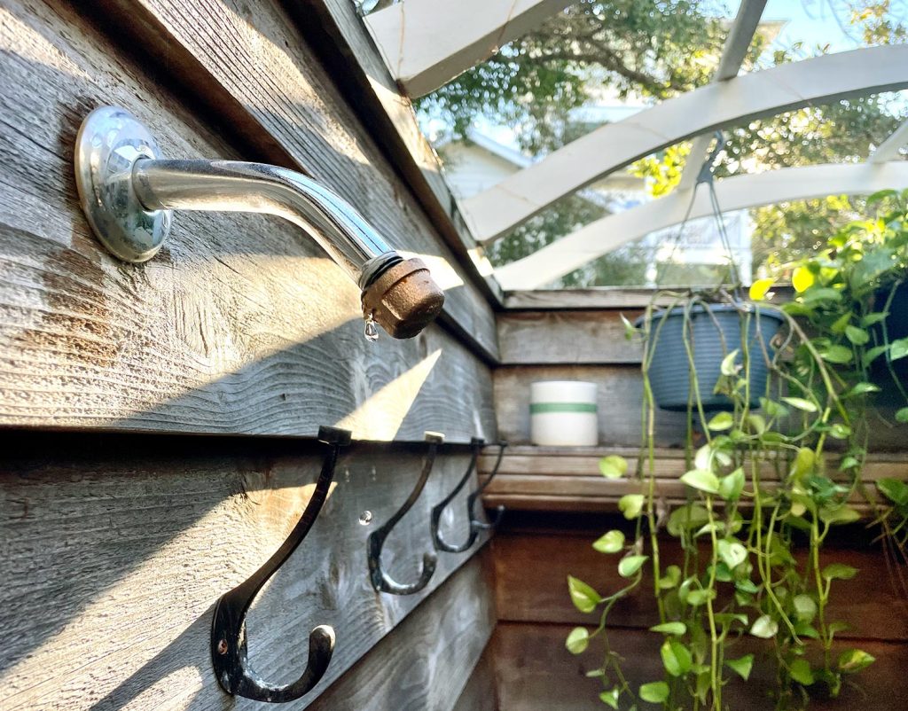 Outdoor Shower With Cap Placed On So It Can Drip To Prevent Freezing