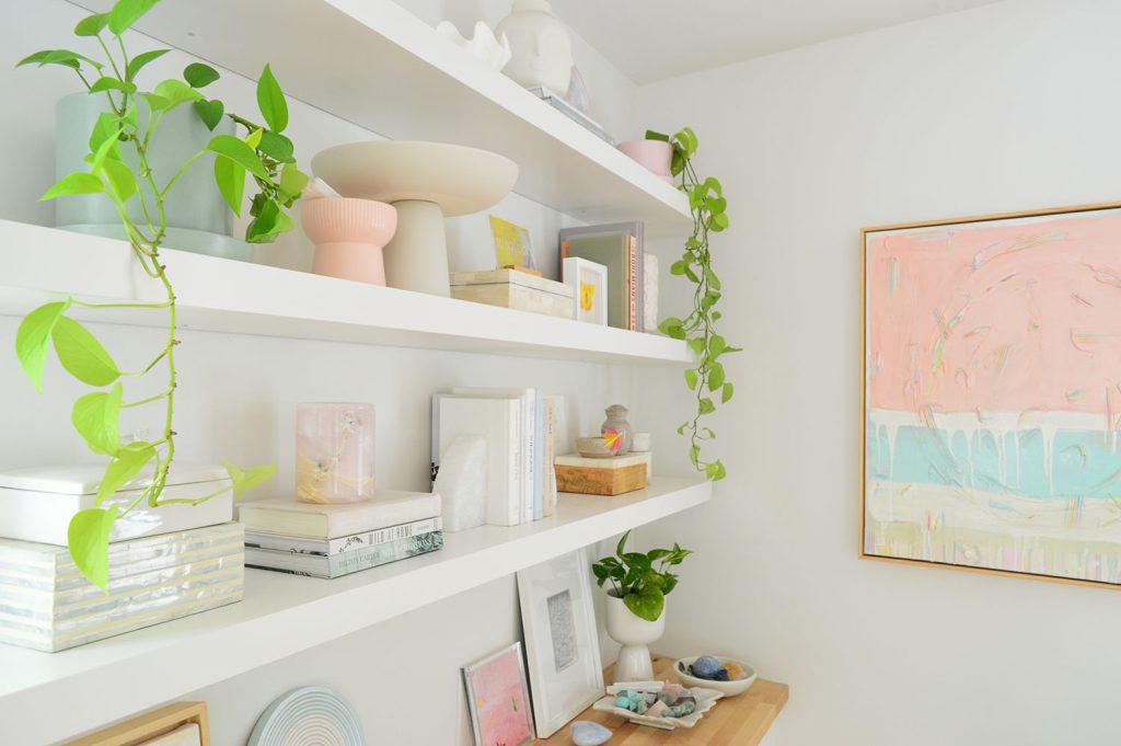 Side View of Three Ikea Lack Floating Shelves With Modern Pink Painting