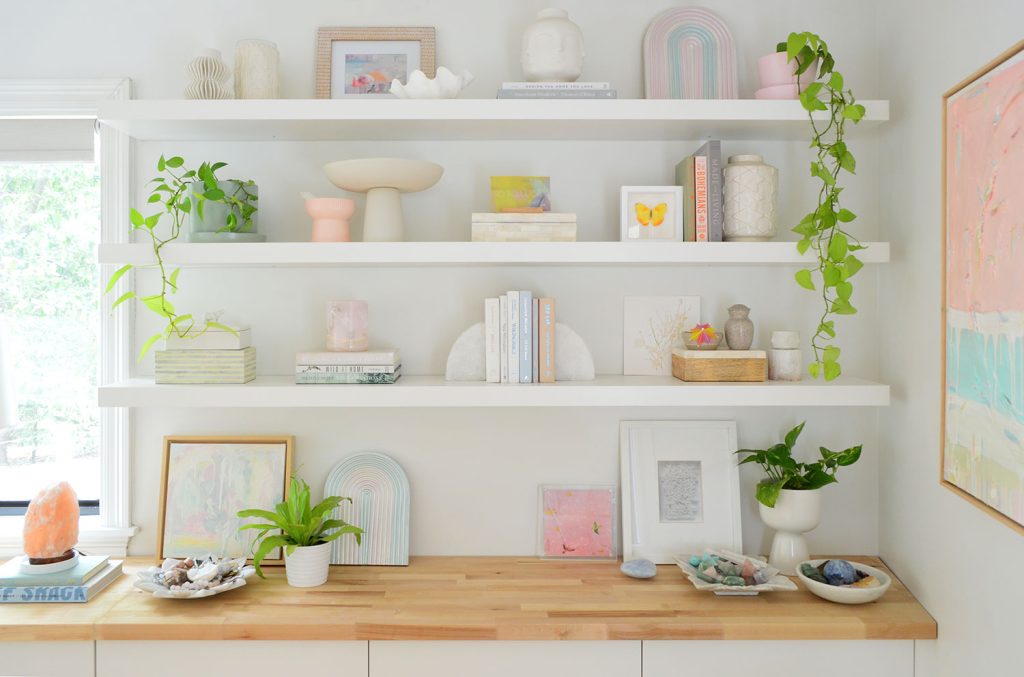 Three Long Ikea Lack Floating Shelves Decorated With Plants Books And Crystals