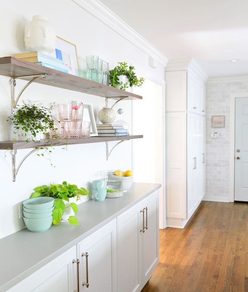 Reclaimed Wood Shelves With Polished Nickel Brackets In White Kitchen