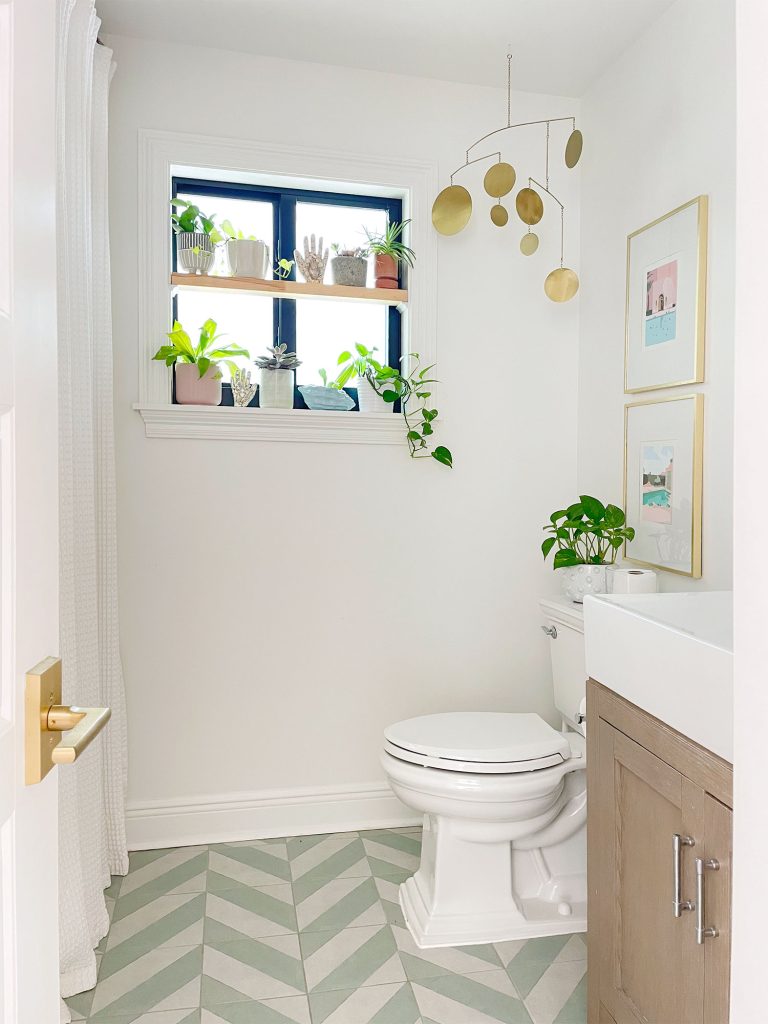 Modern White Bathroom With Mint Chevron Floor And DIY window plant shelf