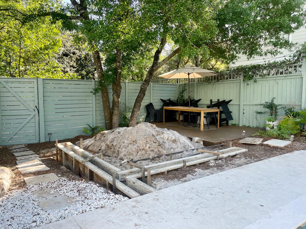 Yard Area Dug Up For Concrete Retaining Wall