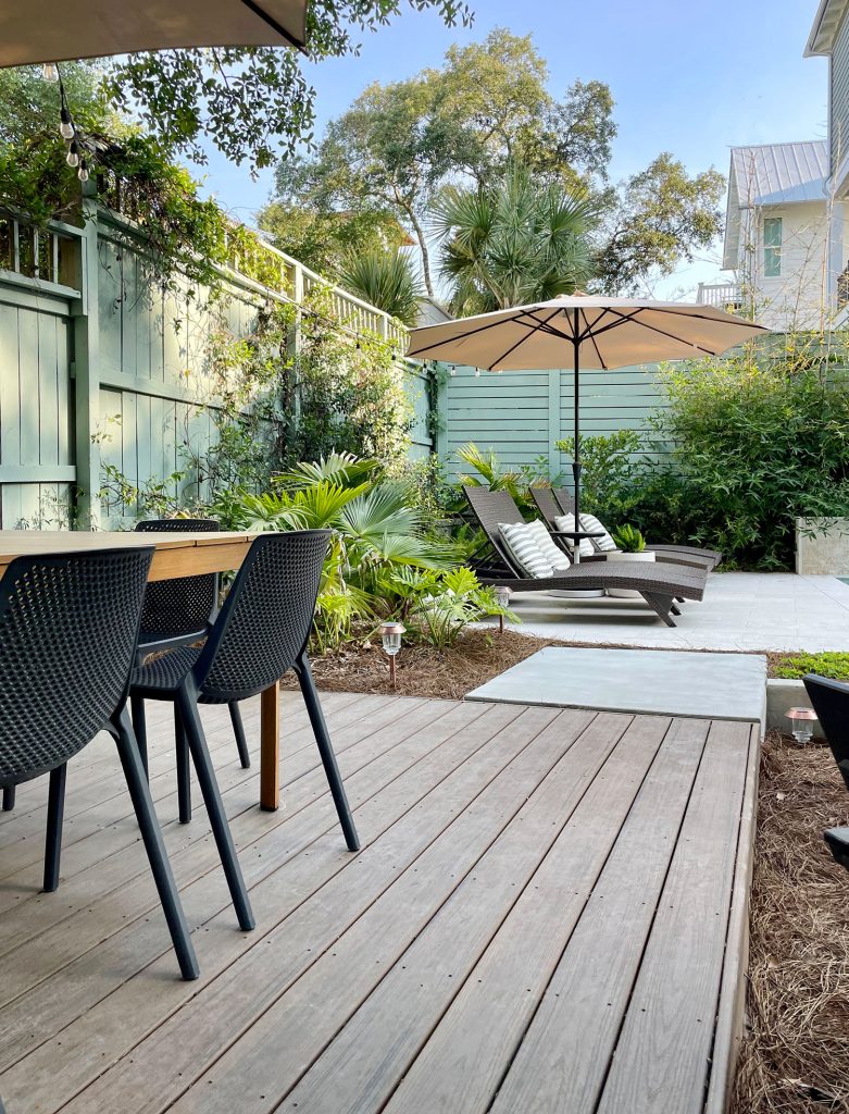 Trex Platform Deck With Dining Table By Backyard Pool 