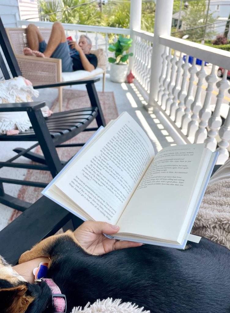 John And Sherry Reading On Porch of Airbnb In Charleston South Carolina