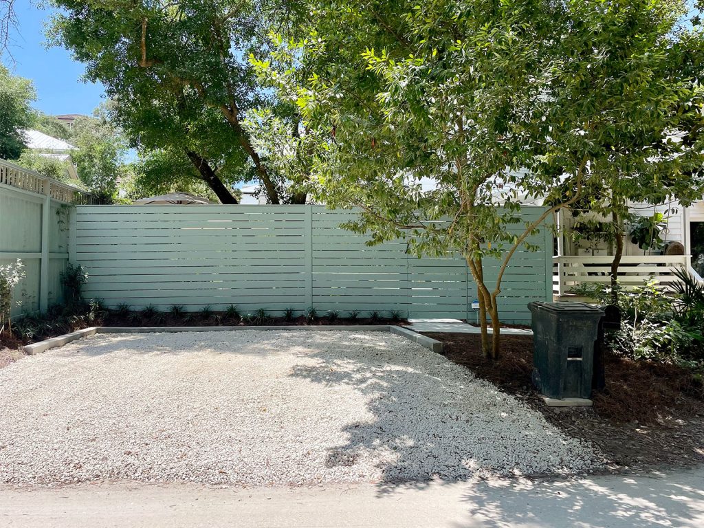 View of new gravel driveway parking spots from street