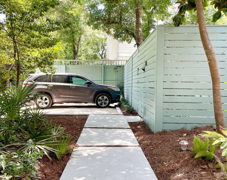 New Gravel Driveway With Large Concrete Walkway