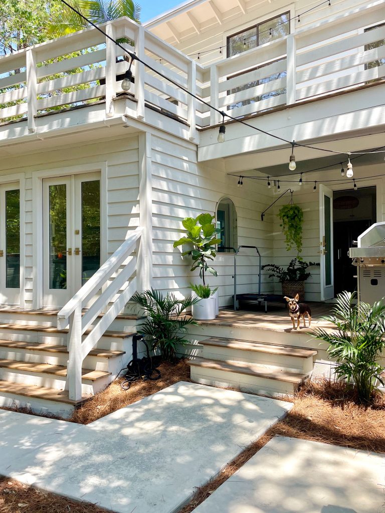 Kitchen Side Porch On White House With Concrete Poured Pavers