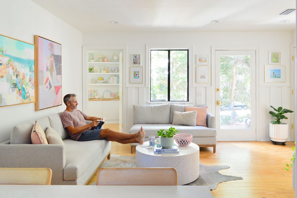 John Sitting In Kitchen Sitting Area With Two Loveseats