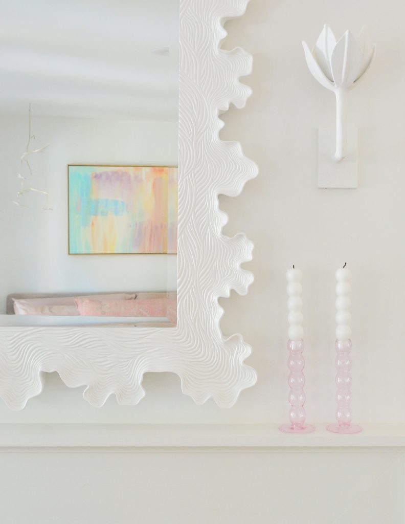Detail Of White Sculptural Clamshell Scalloped Mirror Over Fireplace