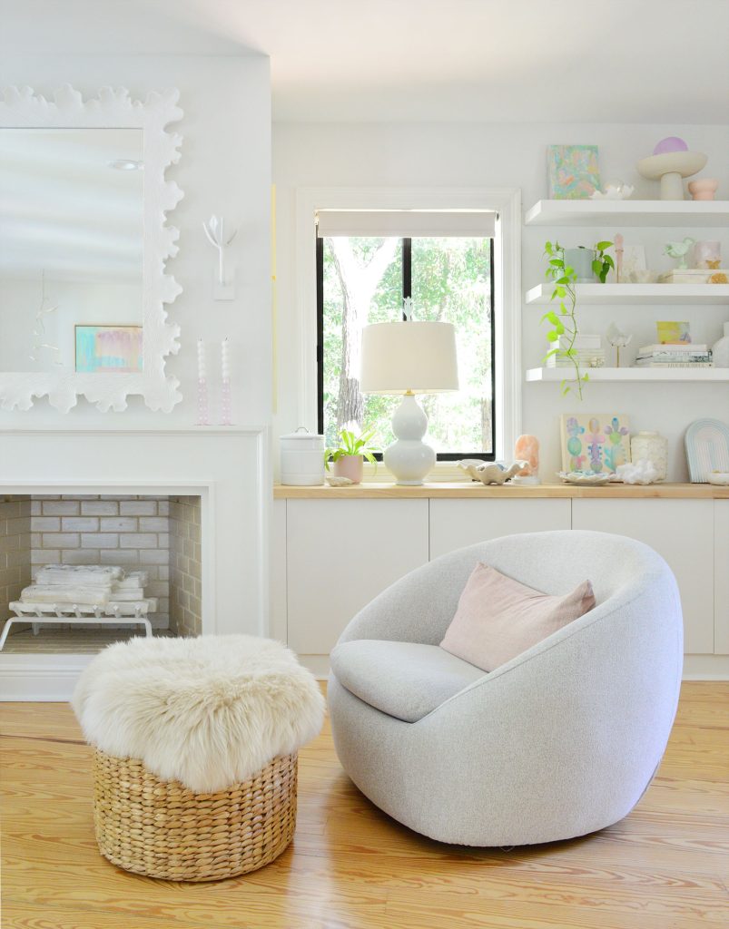 White Beachy Bedroom With West Elm Swivel Chair By Fireplace