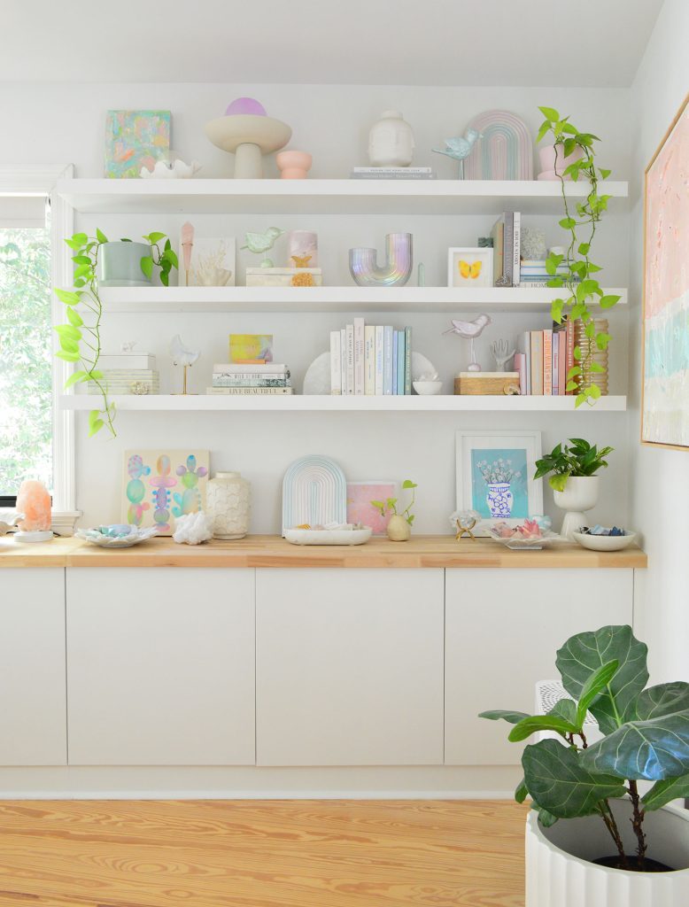 White Ikea Lack Shelves Styled With Beachy Books And Butcher Block Counters