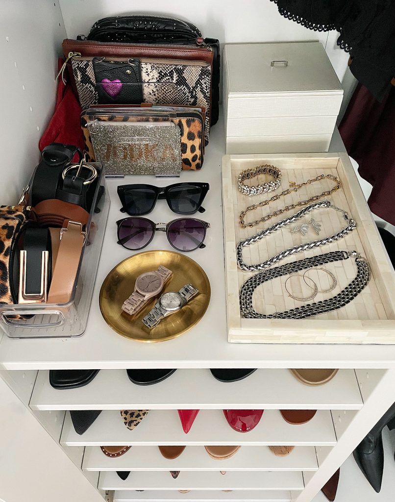 Ikea Pax Wardrobe Closet Overhead of Shelf With Jewelry And Clutches