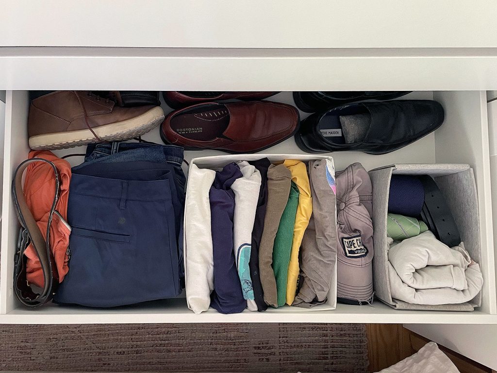 Ikea Pax Wardrobe Closet Overhead Of Open Drawer With Mens Clothes Shoes