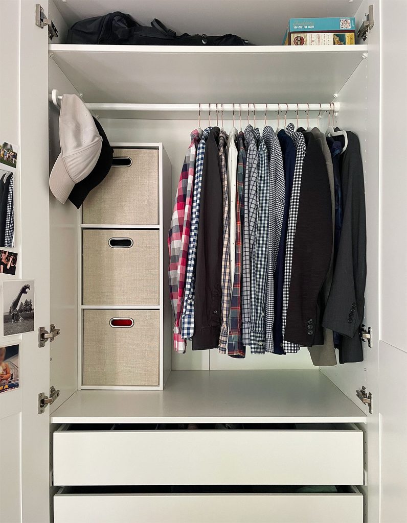 Ikea Pax Wardrobe Closet Open With Mens Shirts On Hanging Rod
