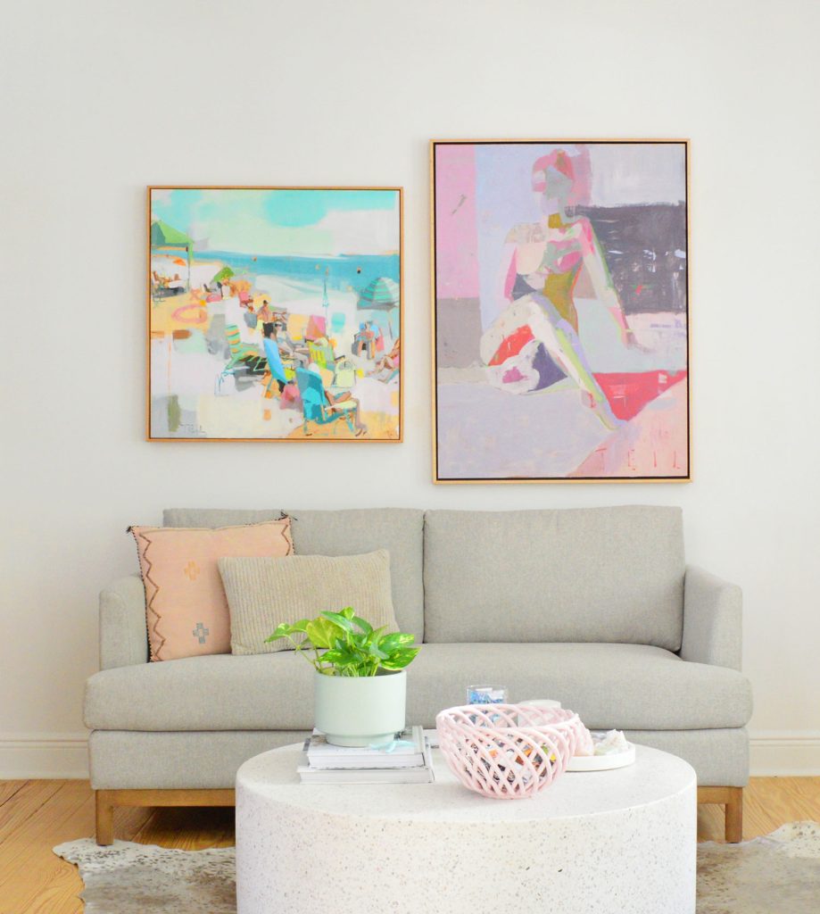 Loveseat With Colorful Paintings On SW Pure White Walls