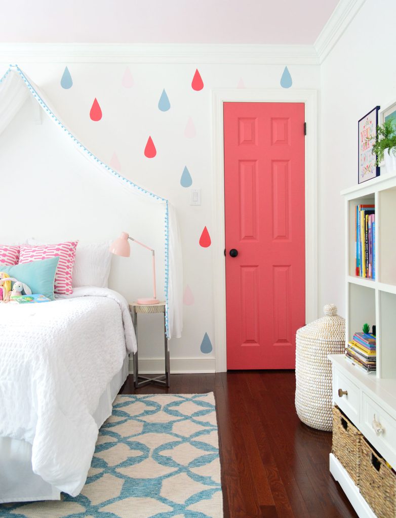 Colorful Little Girls Bedroom With Raindrop And Pink Door On Simply White Walls