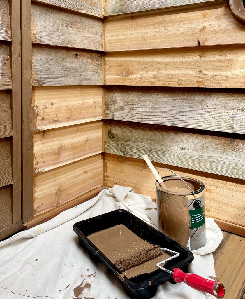 Corner Of Outdoor Shower Caulked With Cedar Colored Caulk