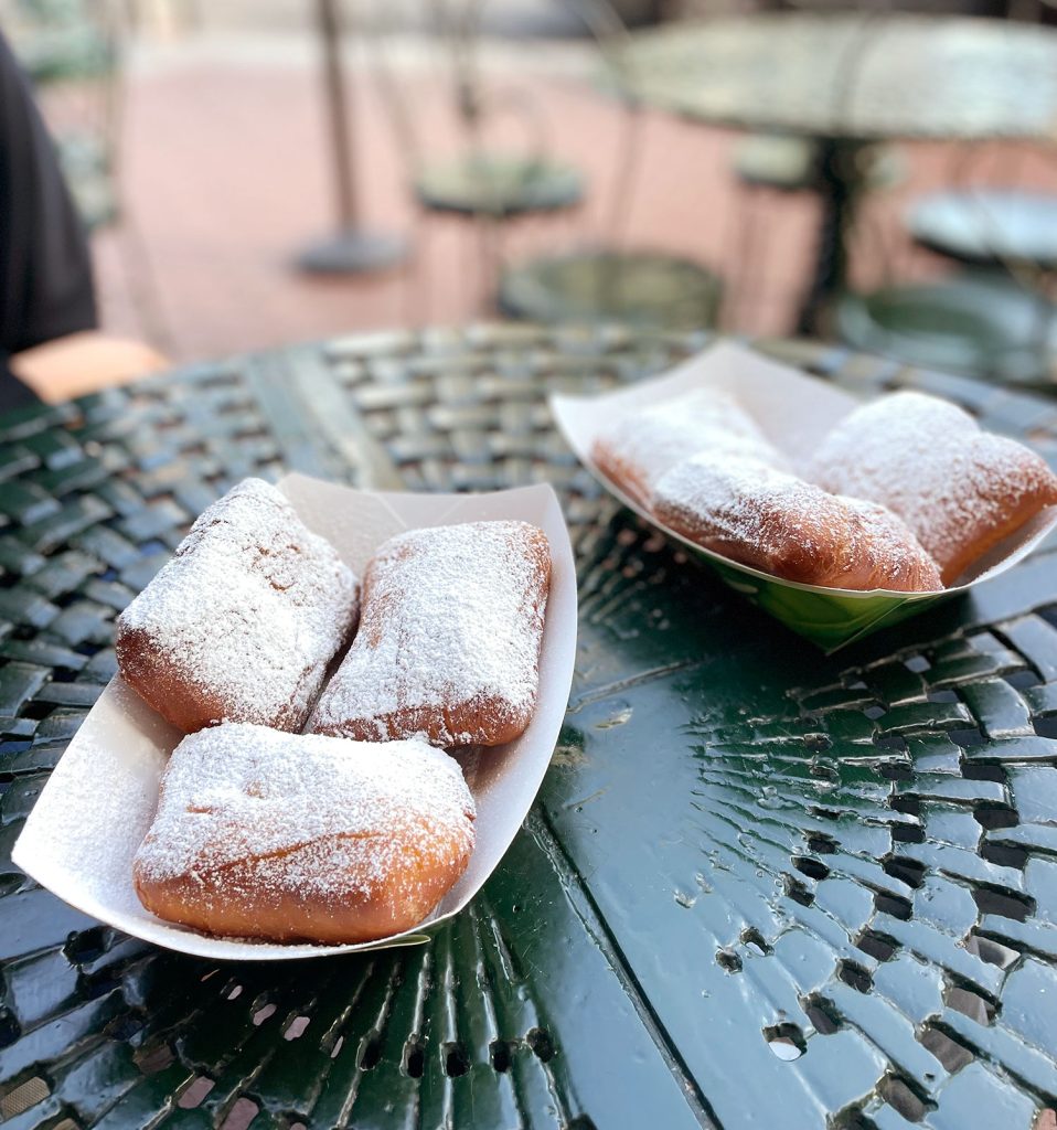 Beignets On Cafe Table In New Orleans