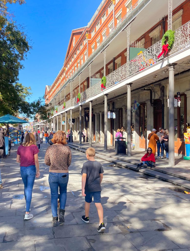 Mom And Kids Walking In French Quarter New Orleans