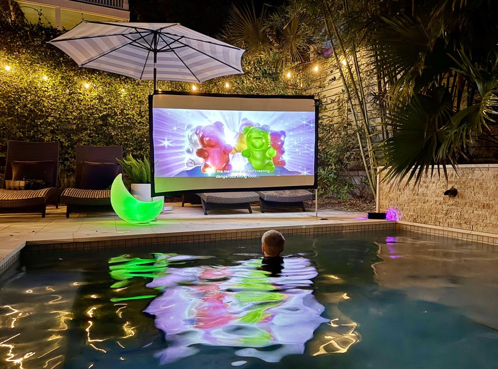 Outdoor Movie Night In Pool With Projector And Screen