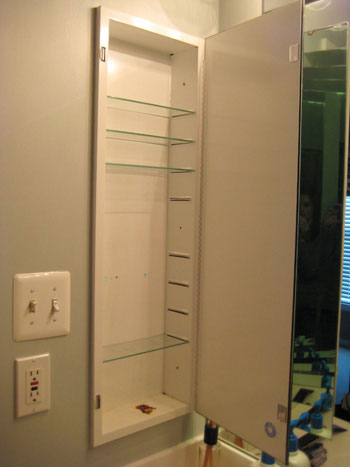 Converted metal medicine cabinet into open shelves I was