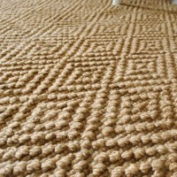 A Large Jute Rug For The Bedroom