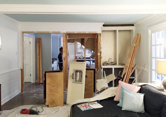 kitchen-demo-wall-coming-down-fireplace