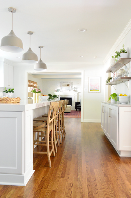 reclaimed wood shelves in white kitchen remodel