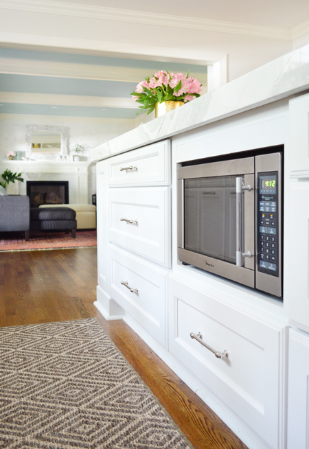 white-kitchen-remodel-final-microwave-with-living-room
