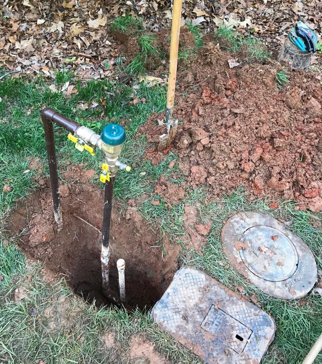 irrigation system backflow preventer with blowout dug up