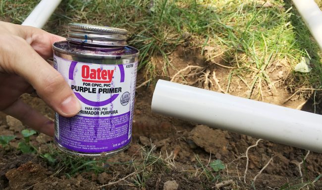 purple primer to connect irrigation system pipes