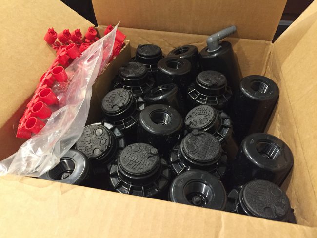 box full of hunter php sprinkler heads for irrigations system