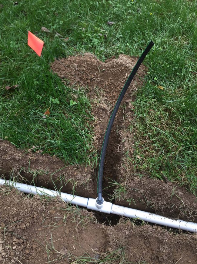 install irrigation system with funny pipe at tee coupling