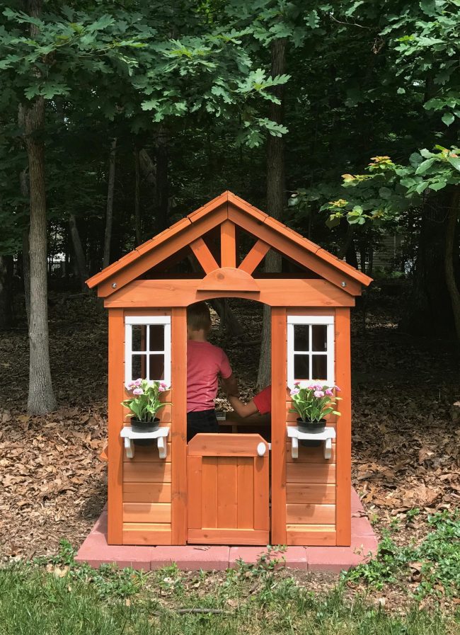 backyard discoveries cedar wooden playhouse kids playing inside