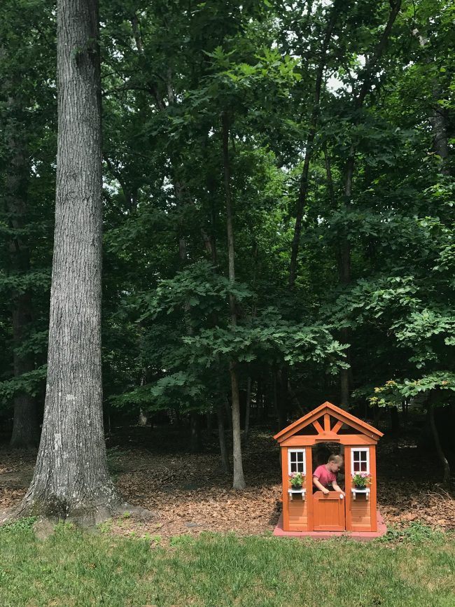 backyard discoveries cedar wooden playhouse next to large tree