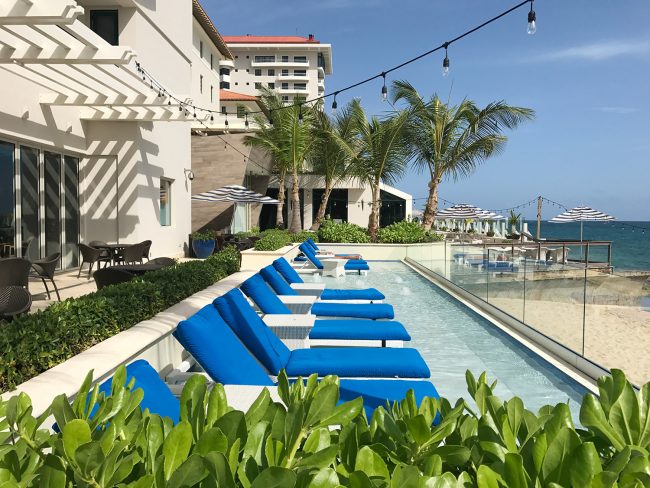 Puerto Rico Condado Vanderbilt Lounge Chairs In Water