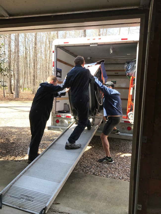 Carrying Stove Off Truck