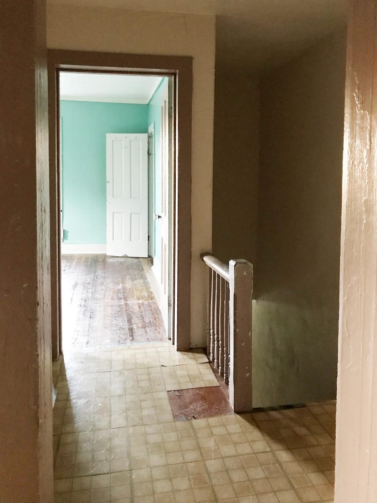 Before Photo Of Upstairs Hallway With Sticky Tile Floor