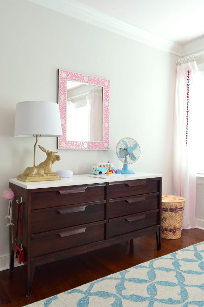 girls bedroom midcentury dresser pink mirror