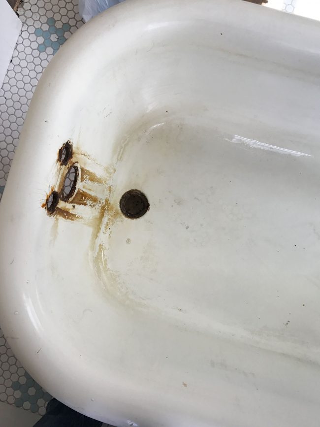 Slightly cleaner white inside of clawfoot tub