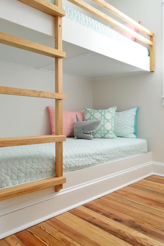 detail of bottom bunk of built in wall to wall bunk beds