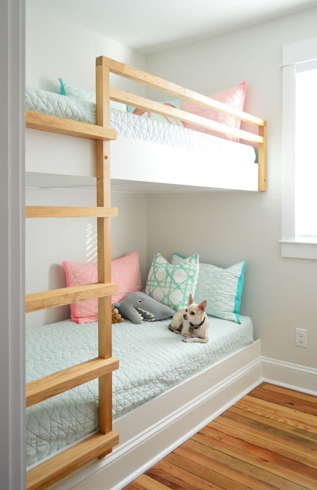diy built in wall to wall bunk beds with dog on bottom bunk
