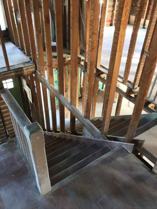 Duplex Demo Looking Down Staircases 650x867